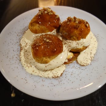 Heritage Tavern - Caramel Profiteroles - Wisconsin Maple Ice Cream, Chantilly Cream, Cardamaro Caramel, Toasted Pecan - New American Near Me - Madison, Wisconsin Heritage Tavern - Caramel Profiteroles - Wisconsin Maple Ice Cream, Chantilly Cream, Cardamaro Caramel, Toasted Pecan - New American Near Me - Madison, Wisconsin