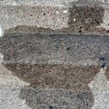 Austad Construction - oil stains left on old cement stairs - General Contractors Near Me - Little Canada, Minnesota