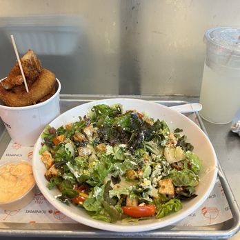 Schnipper's - Cobb salad with ranch dressing and crispy onion rings, and lemonade - Burgers Near Me - New York, New York Schnipper's - Cobb salad with ranch dressing and crispy onion rings, and lemonade - Burgers Near Me - New York, New York