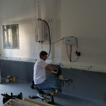 Jerry & Son Heating & Air - Installing gas lines for a tankless water heater. - Heating & Air Conditioning/HVAC Near Me Jerry & Son Heating & Air - Installing gas lines for a tankless water heater. - Heating & Air Conditioning/HVAC Near Me