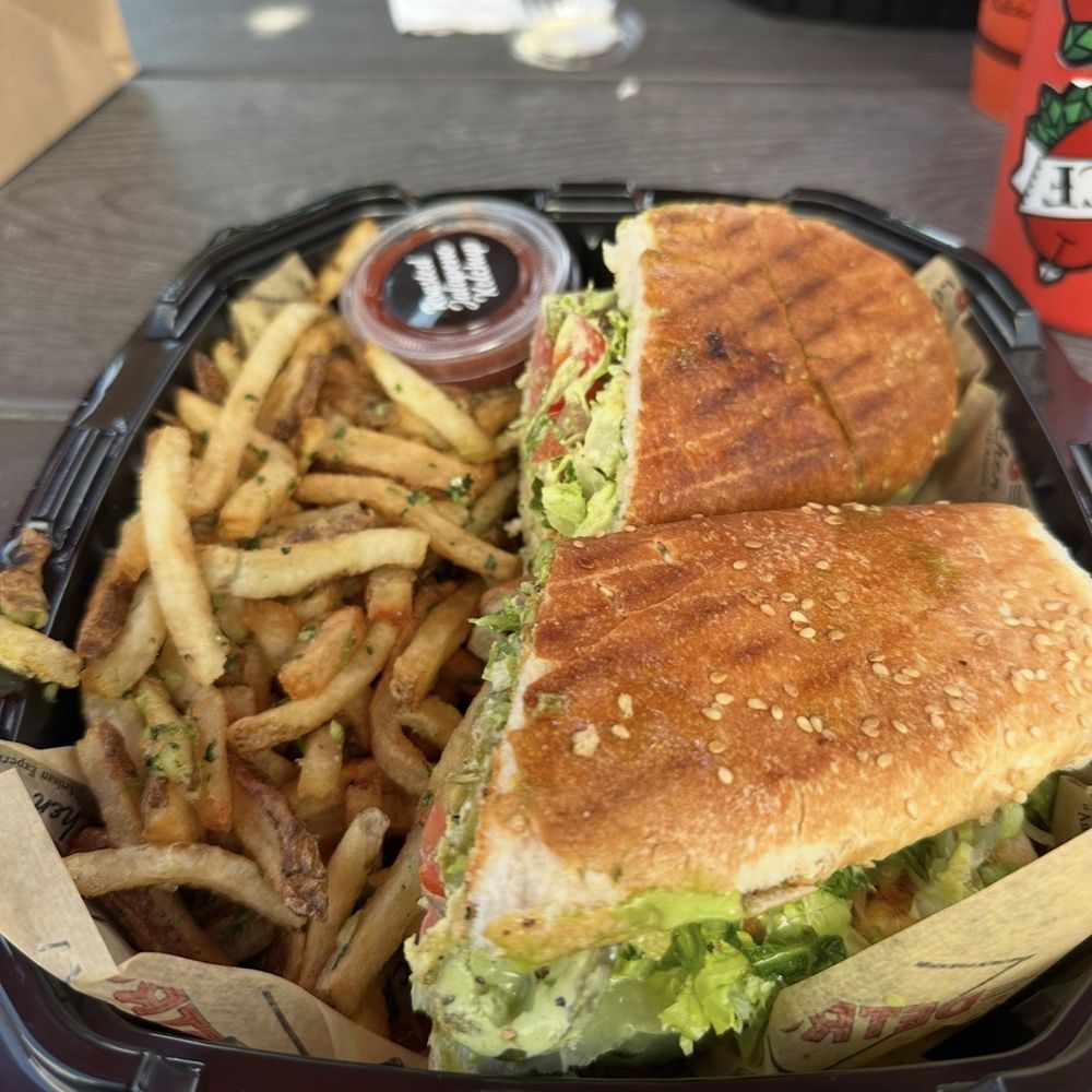 Detroit 75 Kitchen - Chicken sandwich with Garlic Cilantro Fries - Food Trucks Near Me - Detroit, Michigan Detroit 75 Kitchen - Chicken sandwich with Garlic Cilantro Fries - Food Trucks Near Me - Detroit, Michigan