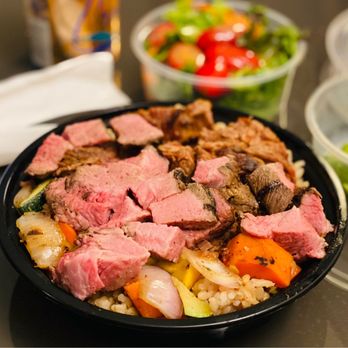Bushfire Kitchen - Del Mar - a plate of meat and vegetables - American Near Me - Del Mar, California