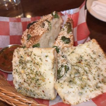 Jr and Son - bread service - garlic bread and olive focaccia - house made and super fresh! - Italian Near Me - Brooklyn, New York Jr and Son - bread service - garlic bread and olive focaccia - house made and super fresh! - Italian Near Me - Brooklyn, New York