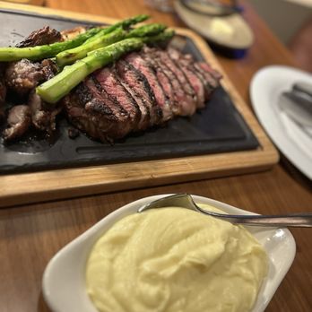 The Great Oak Steakhouse - Tomahawk steak with asparagus and mashed potatoes - Steakhouses Near Me - Temecula, California The Great Oak Steakhouse - Tomahawk steak with asparagus and mashed potatoes - Steakhouses Near Me - Temecula, California