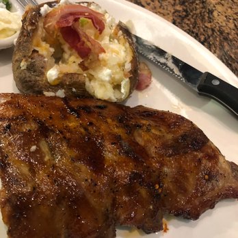 BJ's Restaurant & Brewhouse - 1/2 rack Baby Back Ribs with a loaded baked potato - New American Near Me - Glendale, California