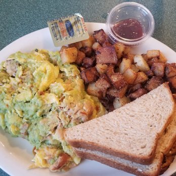 Brother Juniper's - Plain egg scramble ($6.95) with smoked salmon (+$4.25) and avocado spread (+1.25). Comes with home fries or grits and biscuit or toast. - Breakfast & Brunch Near Me - Memphis, Tennessee Brother Juniper's - Plain egg scramble ($6.95) with smoked salmon (+$4.25) and avocado spread (+1.25). Comes with home fries or grits and biscuit or toast. - Breakfast & Brunch Near Me - Memphis, Tennessee