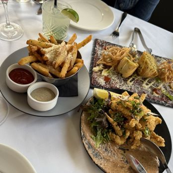 Riley's Vancouver - Truffle fries, Wagyu Beef Carpaccio, and calamari - Seafood Near Me - Vancouver, British Columbia Riley's Vancouver - Truffle fries, Wagyu Beef Carpaccio, and calamari - Seafood Near Me - Vancouver, British Columbia