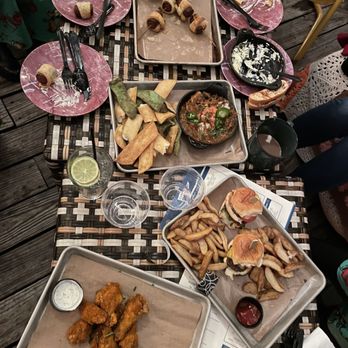 Bobby Hotel Rooftop Lounge - a table full of food - Cocktail Bars Near Me - Nashville, Tennessee Bobby Hotel Rooftop Lounge - a table full of food - Cocktail Bars Near Me - Nashville, Tennessee