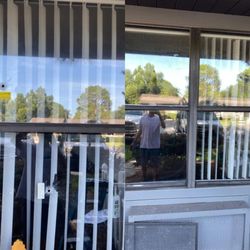 Affordable Glass Repair Services - Bullet holes in an insulated unit before and after