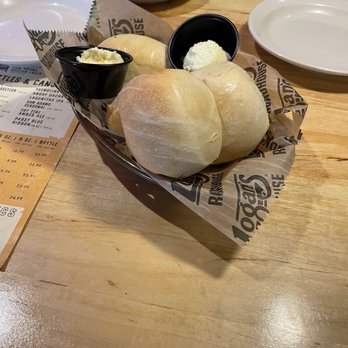 Logan's Roadhouse - Bread and butter given to you while you wait on your food. - Steakhouses Near Me - McDonough, Georgia Logan's Roadhouse - Bread and butter given to you while you wait on your food. - Steakhouses Near Me - McDonough, Georgia