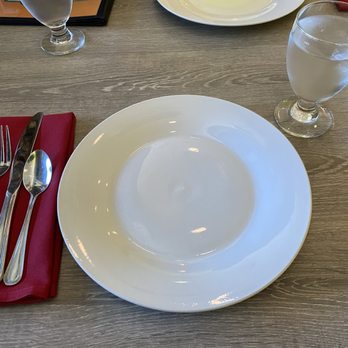 Great Indian Kitchen - China, heavy flatware, crisp large linens, frosty glasses of pure water, little extras that signal quality and care. - Indian Near Me - Valencia, California