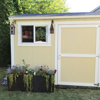 Tuff Shed Seattle - New Tuff shed, after adding a few birdhouses and flowers - General Contractors Near Me - Pacific, Washington