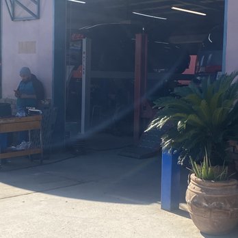 Jaime's Tire & Muffler - Cars being lifted - Auto Repair Near Me - San Antonio, Texas