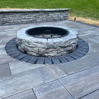 Champion Gardens - New patio and fire pit with retaining wall - Landscaping Near Me