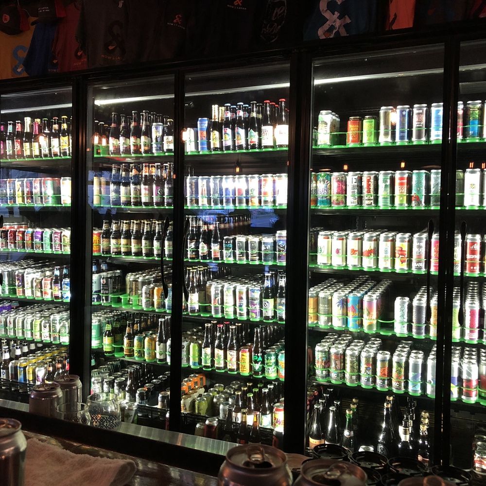 a display of beer in a cooler a display of beer in a cooler