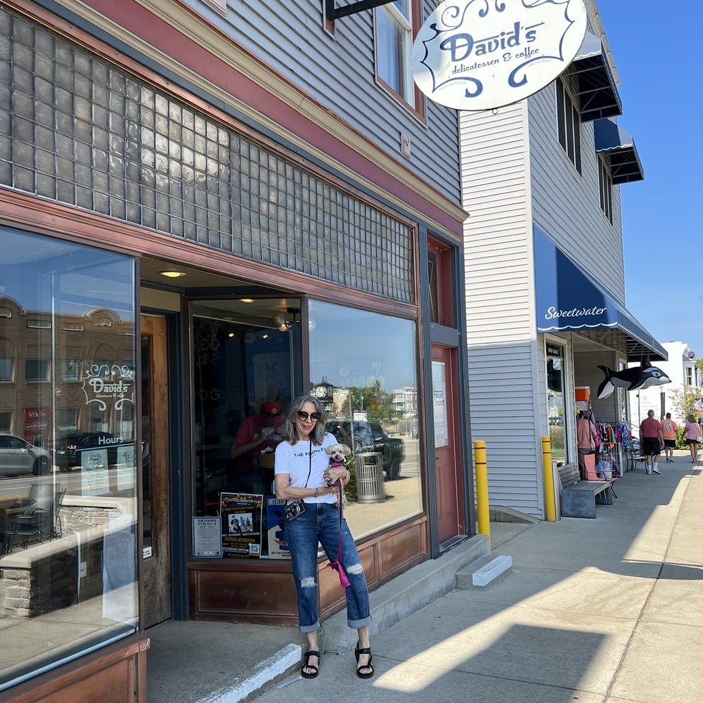 David's Delicatessen & Coffee - a woman standing in front of a store - Delis Near Me - New Buffalo, Michigan David's Delicatessen & Coffee - a woman standing in front of a store - Delis Near Me - New Buffalo, Michigan
