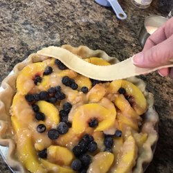 Starting the lattice of a Peach Blueberry Pie