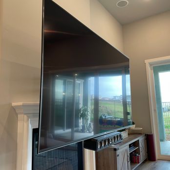 First Choice Custom Installations - TV brought down to viewing height - Security Systems Near Me First Choice Custom Installations - TV brought down to viewing height - Security Systems Near Me