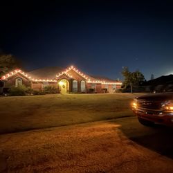 Magee’s Holiday Lighting  - Beautiful candy cane scheme done on this beautiful home! Candy cane sure it popular this year!