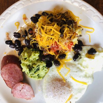 Sweetwater Branch Inn - Made to order organic eggs, southwestern frittata with black beans, bell peppers and shredded cheese, home made guac, and kielbasa - Bed & Breakfast Near Me - Gainesville, Florida