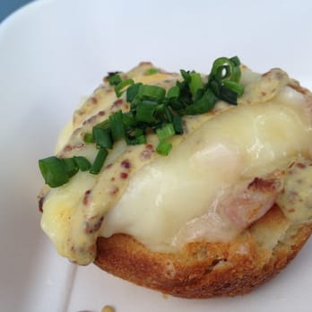 Yolk's Breakfast - Coq Madame, a single super tasty egg in a fluffy pastry with cheese, ham & mustard.. that fits in your palm.. Full of flavor - Breakfast & Brunch Near Me