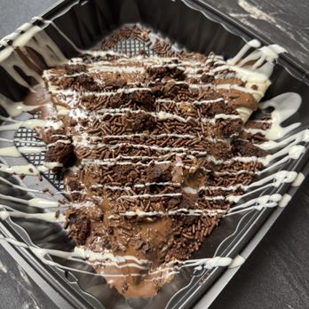 Twisted Rolls Chimney Cake - Nutelle Crepe, with ferreo, brownie and chocolate sprinkle toppings. - Ice Cream & Frozen Yogurt Near Me - Ballwin, Missouri