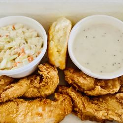 Chicken Express - 4 Express Tenders with Regular Cole Slaw and a biscuit on the side. Tenderest, Juiciest, and Meatiest Tenders I have tried in my life!!!