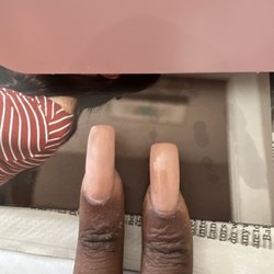 LA Nails - My flared index nail composited to one that is my desired shape. She argued instead of fixing the shape.