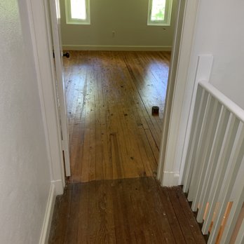 Industria Remodeling - *Before* - unfinished hall previously carpeted and bedroom with yellowed/Orange finish (yuck) - Flooring Near Me - Gaithersburg, Maryland
