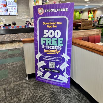 Chuck E. Cheese - a sign in a fast food restaurant - Pizza Near Me - Knoxville, Tennessee