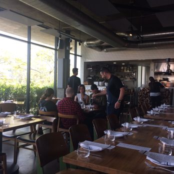 Trust - The dining room begins to fill. - New American Near Me - San Diego, California