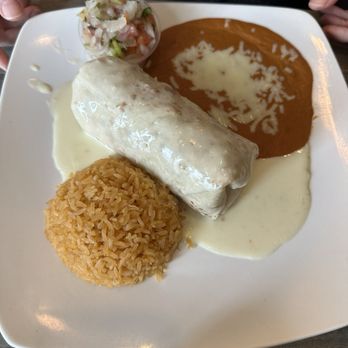 Two Compadres Taqueria Bar & Grill - Burrito Macias » burrito filled with grilled chicken and chorizo. Topped with melted cheese and pico de gallo, served with Spanish rice - Mexican Near Me - Midlothian, Virginia