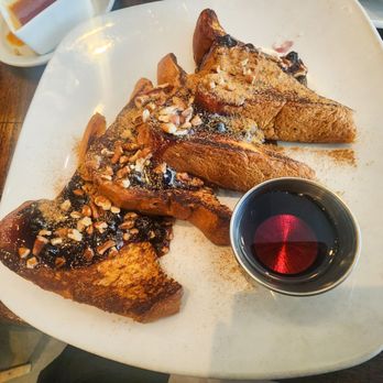 Sanfords Astoria - Cinnamon Pecan French Toast (with blueberry compote). It was so good that I never used the syrup. Soft and delicious. - Breakfast & Brunch Near Me - Astoria, New York Sanfords Astoria - Cinnamon Pecan French Toast (with blueberry compote). It was so good that I never used the syrup. Soft and delicious. - Breakfast & Brunch Near Me - Astoria, New York