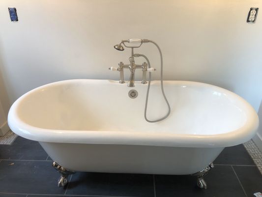 Bathroom Remodel - This client asked me to move the sink and toilet to the opposite side of the bathroom and then install the claw foot tub in that same location. The client was very happy with the finished product.