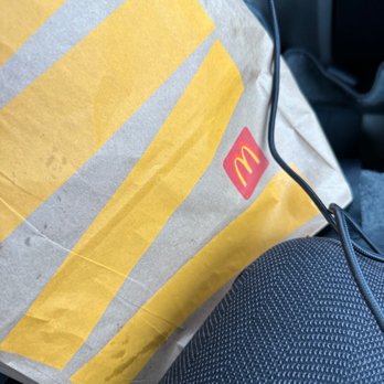 McDonald's - a mcdonald's logo on a pillow - Fast Food Near Me - Phelan, California