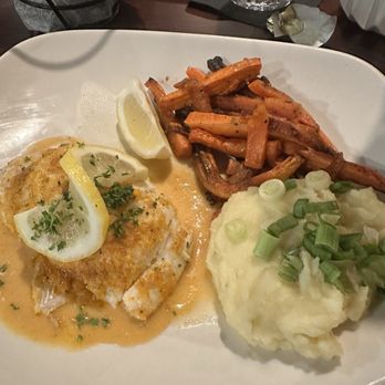 The Cellar Bar & Grille - Baked stuffed haddock with mashed potatoes and toasted carrots - New American Near Me - Northborough, Massachusetts