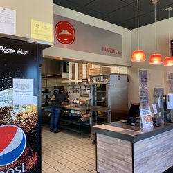 Pizza Hut - Insai da stoa. Gotta chek da pepsi soda coolaa. The sodas was small kine warm when yu tirsty