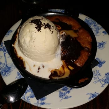 FINKA Table & Tap - Fresh baked Chocolate chip topped with ice cream. FYI, their dessert menu changes frequently - Asian Fusion Near Me - Miami, Florida FINKA Table & Tap - Fresh baked Chocolate chip topped with ice cream. FYI, their dessert menu changes frequently - Asian Fusion Near Me - Miami, Florida