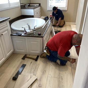 Cornerstone Floors - installing the new vinyl planks - Flooring Near Me - Los Alamitos, California