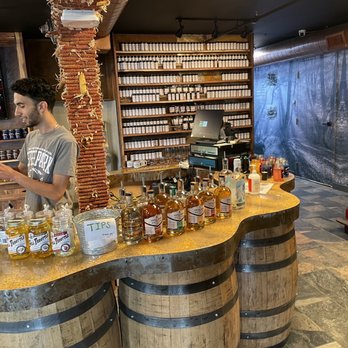 Michael Ballard’s Full Throttle Distrillery - a man standing at the counter - Distilleries Near Me - Estes Park, Colorado Michael Ballard’s Full Throttle Distrillery - a man standing at the counter - Distilleries Near Me - Estes Park, Colorado