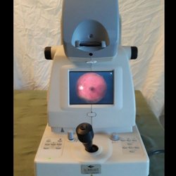 Rose Eye Clinic - Retinal Camera with an image of my son's retina