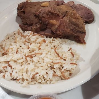 Wael's Mediterranean Cuisine - Roast beef, rice and the homemade hot sauce - Greek Near Me - Houston, Texas Wael's Mediterranean Cuisine - Roast beef, rice and the homemade hot sauce - Greek Near Me - Houston, Texas