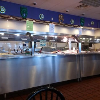 Cajun King - It's strange to see a sink/work station against the wall. (But they are cooking in the back kitchen). - Cajun/Creole Near Me - New Orleans, Louisiana