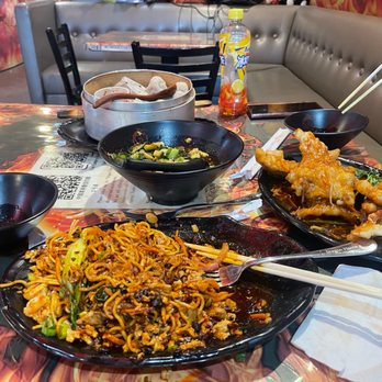 Dragon Flame Chinese Grill - 10 Piece Steamed Pork Dumplings Legendary Lemon Chicken cucumber salad  Lamb Rice Noodle - Noodles Near Me - Tempe, Arizona