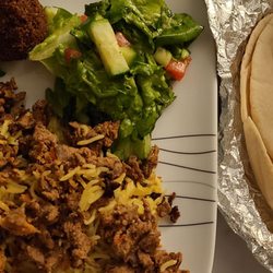 Ali Baba's Cafe - Chicken, beef, rice, house salad, falafeland pita from the meal for 2 special. We added a side of hummus