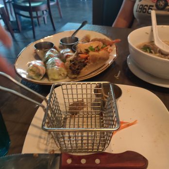 Saigon District Restaurant Presotea - The remains of what was a bahmi sandwich, sampler platter, and of course their #18 pho....everything was DELICIOUS!!! - Vietnamese Near Me - Huntington Beach, California Saigon District Restaurant Presotea - The remains of what was a bahmi sandwich, sampler platter, and of course their #18 pho....everything was DELICIOUS!!! - Vietnamese Near Me - Huntington Beach, California
