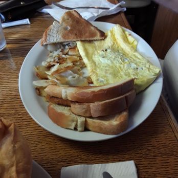 Country Skillet - a plate of eggs, toast, and bread - New American Near Me - Adams, Wisconsin Country Skillet - a plate of eggs, toast, and bread - New American Near Me - Adams, Wisconsin