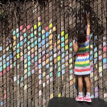 GeoKids - Child with art in preschool outdoor yard - Preschools Near Me - Menlo Park, California GeoKids - Child with art in preschool outdoor yard - Preschools Near Me - Menlo Park, California