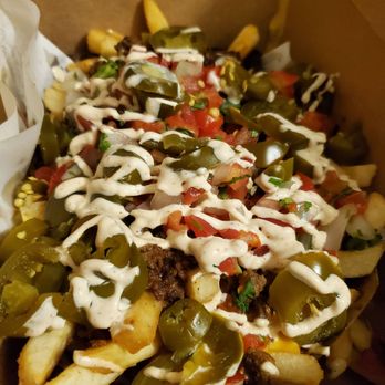Nacho Bizness - The bizness with fries, carne asada, and jalapeno cheddar cheese - Mexican Near Me - Monterey, California