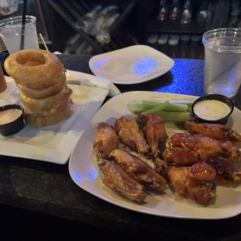 Local Brewing - 10 Naked Wings & Gooses Onion Rings - New American Near Me - Palm Harbor, Florida Local Brewing - 10 Naked Wings & Gooses Onion Rings - New American Near Me - Palm Harbor, Florida